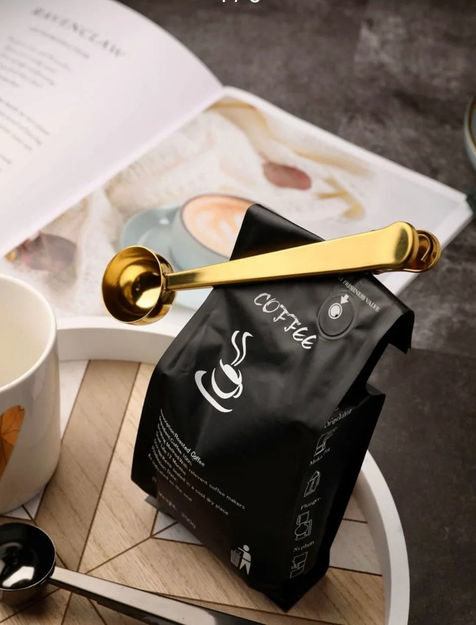 Cuchara con pinza para café